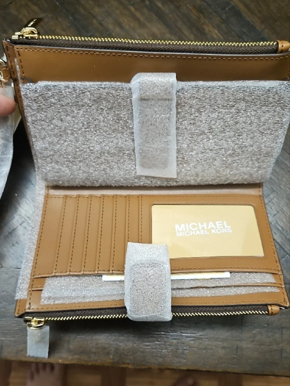 Michael Kors Brown Monogram Zip-Around Wallet with Gold Logo